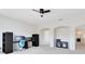 A spacious room, featuring carpet, a ceiling fan, and ample space for furniture and office equipment at 15485 Sandfield Loop, Winter Garden, FL 34787