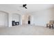 Large bonus room with a neutral color palette, carpeted floor, and open archways at 15485 Sandfield Loop, Winter Garden, FL 34787