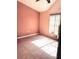 Bedroom featuring tile floors, a ceiling fan, and a large window at 1621 Emily Ct, Kissimmee, FL 34744