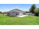 Well-maintained backyard with ample green space and privacy fencing at 1653 Turtle Rock Dr, Lakeland, FL 33803