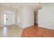 Inviting foyer with tile and wood flooring, offering a warm welcome at 1653 Turtle Rock Dr, Lakeland, FL 33803