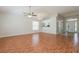Large, airy living room with wood floors and open access to the foyer at 1653 Turtle Rock Dr, Lakeland, FL 33803