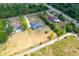 Overhead view showcasing the well-spaced homes, long driveways, and some properties featuring pools in a natural setting at 18920 Overton St, Orlando, FL 32833