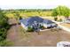 An aerial view of a well-maintained home with a large yard and inviting outdoor spaces at 18920 Overton St, Orlando, FL 32833