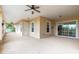 Large, covered back porch with ceiling fans and access to the backyard at 18920 Overton St, Orlando, FL 32833