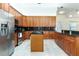 Well-appointed kitchen with stainless steel appliances, granite countertops, and ample cabinet space for storage at 18920 Overton St, Orlando, FL 32833