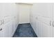 Large walk-in closet offering ample storage space with built-in shelving and rods on both sides at 18920 Overton St, Orlando, FL 32833