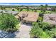 Beautiful aerial view of home with a tile roof, meticulous landscaping, and a paved driveway at 196 Torino Ln, Kissimmee, FL 34759