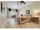 Relaxing bedroom with neutral walls, a bed, and windows for light coming into the room at 196 Torino Ln, Kissimmee, FL 34759