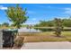 Enjoy serene backyard views of the pond with beautiful landscaping at 2029 Crystal Bell St, Orlando, FL 32824
