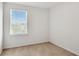Neutral carpeted bedroom features a bright window with blinds and white walls at 2029 Crystal Bell St, Orlando, FL 32824