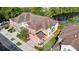 Aerial view of townhome in a community surrounded by water at 2112 Rookery Ln, Sanford, FL 32773