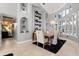Elegant dining room features high ceilings, detailed trim, and a large window for natural light at 2241 Lake Vilma Dr, Orlando, FL 32835