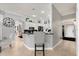 Bright open-concept kitchen featuring sleek black countertops and eat-in breakfast nook at 2241 Lake Vilma Dr, Orlando, FL 32835