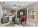 A living room or bonus area with comfortable seating and an entertainment center at 2241 Lake Vilma Dr, Orlando, FL 32835