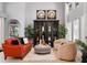 Inviting living room featuring tile flooring, tall windows, and elegant furnishings at 2241 Lake Vilma Dr, Orlando, FL 32835