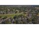 Amazing aerial view of the golf course community showcasing a mature green landscape at 2302 Edmonton Ct, Clermont, FL 34711
