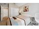 Comfortable bedroom featuring carpet flooring, a queen size bed, a closet, and a side table with lamp at 2302 Edmonton Ct, Clermont, FL 34711
