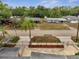 Aerial view of home showcasing landscaping, hardscaping, and surrounding neighborhood at 2303 Bonneville Dr, Orlando, FL 32826