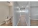 Bedroom with light gray walls, light wood-look floors, one window and one door at 2303 Bonneville Dr, Orlando, FL 32826