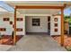 View of a two-car carport with decorative brickwork and covered parking area, leading to the home's entrance at 2303 Bonneville Dr, Orlando, FL 32826