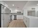 Well-equipped kitchen with stainless steel appliances and modern backsplash at 2303 Bonneville Dr, Orlando, FL 32826