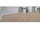 Spacious living area seamlessly blends living room, dining, and modern kitchen at 2303 Bonneville Dr, Orlando, FL 32826