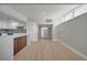 Open floor plan with stylish kitchen island, connecting living and dining areas at 2303 Bonneville Dr, Orlando, FL 32826