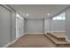 Large living space showcasing updated flooring, recessed lighting, and fresh neutral paint at 2303 Bonneville Dr, Orlando, FL 32826