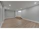 Expansive open-concept living area with new flooring, providing a seamless and stylish space at 2303 Bonneville Dr, Orlando, FL 32826