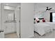 Bright bedroom featuring two beds, fun decor, and ceiling fan at 2382 Zaballina Pl, Kissimmee, FL 34747