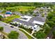 Aerial view of community center, baseball field, playground, and lush greenery at 2460 Formax Dr, Orlando, FL 32828