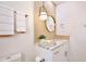 Updated bathroom with granite countertops, pendant lighting, and white vanity at 2460 Formax Dr, Orlando, FL 32828