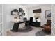 Home office featuring built-in shelving and an ergonomic workspace at 2460 Formax Dr, Orlando, FL 32828