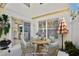Outdoor patio with a cozy seating area and dining furniture at 2460 Formax Dr, Orlando, FL 32828