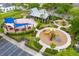 Aerial view of community playground with colorful slides and a covered picnic area at 2460 Formax Dr, Orlando, FL 32828