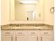 Granite countertops and double sinks highlight this bathroom vanity at 2524 Harmonia Hammock Rd, Harmony, FL 34773