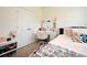 Bedroom featuring large closet and adjacent vanity at 2524 Harmonia Hammock Rd, Harmony, FL 34773