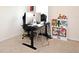Bedroom setup as an office features an adjustable height desk at 2524 Harmonia Hammock Rd, Harmony, FL 34773