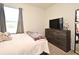 Bedroom featuring window with view to the exterior at 2524 Harmonia Hammock Rd, Harmony, FL 34773