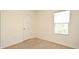 Empty carpeted bedroom at 2524 Harmonia Hammock Rd, Harmony, FL 34773