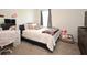 Bedroom filled with natural light and comfortable décor at 2524 Harmonia Hammock Rd, Harmony, FL 34773