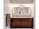 Bathroom featuring a double sink vanity and modern lighting at 2803 Tech Dr, Orlando, FL 32817