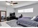 Inviting bedroom with natural light, a ceiling fan, and a spacious layout, perfect for relaxation and personal style at 2803 Tech Dr, Orlando, FL 32817