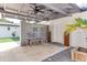 Charming covered entry with brick detail, ceiling fan, and white door at 2803 Tech Dr, Orlando, FL 32817