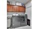 Laundry room featuring a modern washer and dryer, and cabinets at 2803 Tech Dr, Orlando, FL 32817