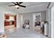 Open-concept living area, showcasing bright tile floors and a kitchen view that enhances the home's spacious feel at 2803 Tech Dr, Orlando, FL 32817