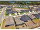 Aerial view of several homes in a residential neighborhood by a lake at 292 Spirit Landings Cir, Winter Haven, FL 33880