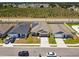Aerial view of the home's exterior, featuring a well-manicured front yard and solar panels at 292 Spirit Landings Cir, Winter Haven, FL 33880