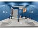 Contemporary bathroom with a double vanity, stylish vessel sinks, modern fixtures, and a large mirror at 302 Hermits Trl, Altamonte Springs, FL 32701